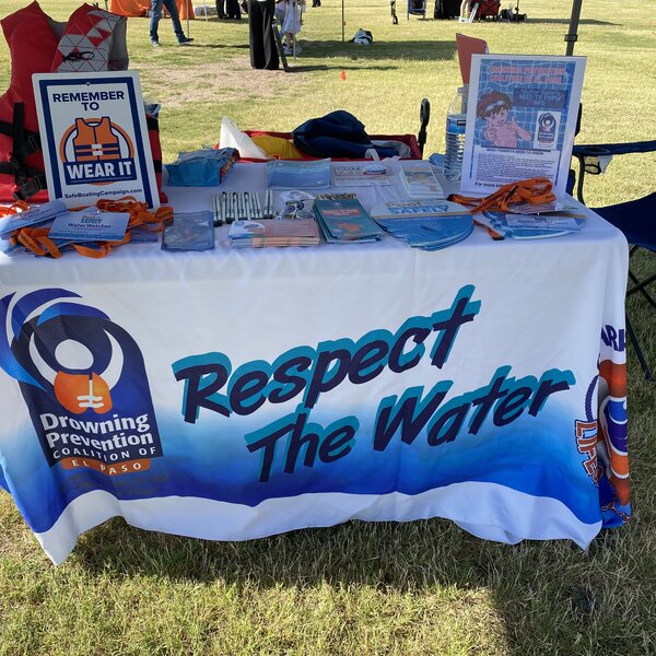 EDUCATIONAL BOOTH WITH FLYERS & HANDOUTS ABOUT WATER SAFETY