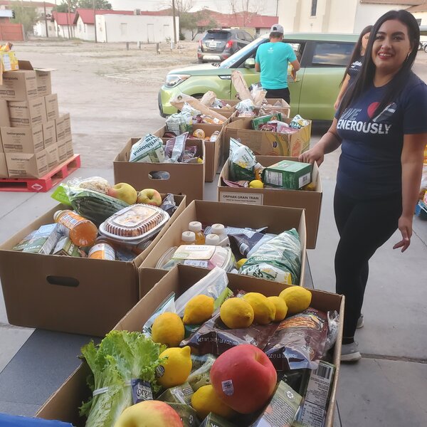 YLM's Emergency Food Pantry partners with El Pasoans Fighting Hunger to distribute food boxes to over 150 families every Saturday morning.