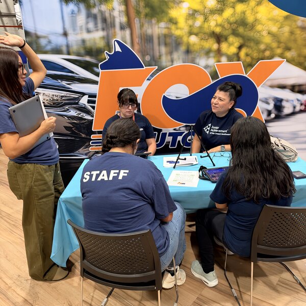 Participants engaging with local volunteers
