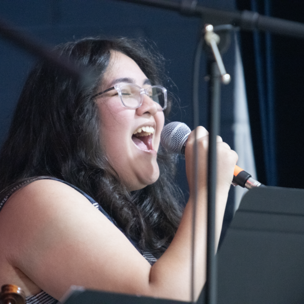Belting out an original composition