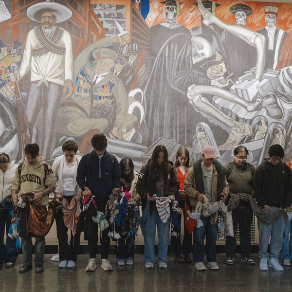 Students from Social Impact Program at Dartmouth College in front of Jose Clemente Orozco's Mural The Epic of American Civilization inside the campus library in New Hampshire. 
