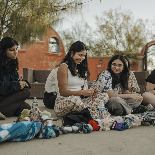 Students from Social Impact program in Dartmouth College braiding La Trenza in Abara Frontiers Hacienda