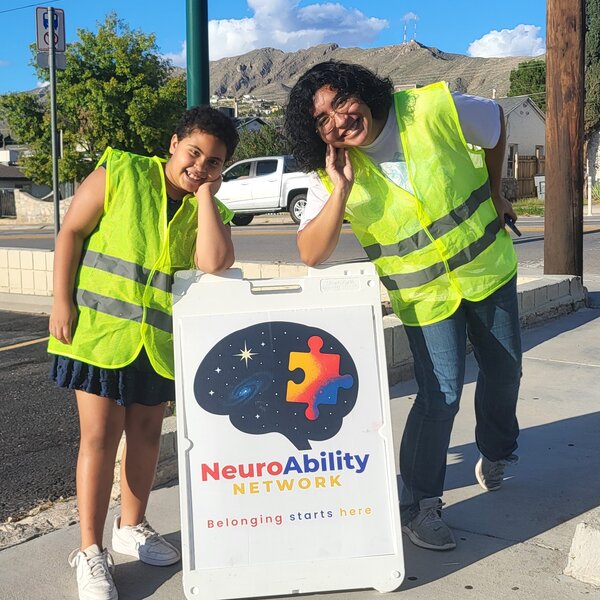 Participants raising funds by parking cars for local concerts. 