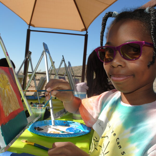 Girl paints her version of the mountains during our Franking Mountains artmaker camp.
