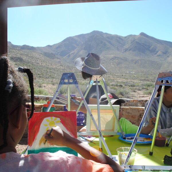 Girl paints her version of the mountains during our Franking Mountains artmaker camp.