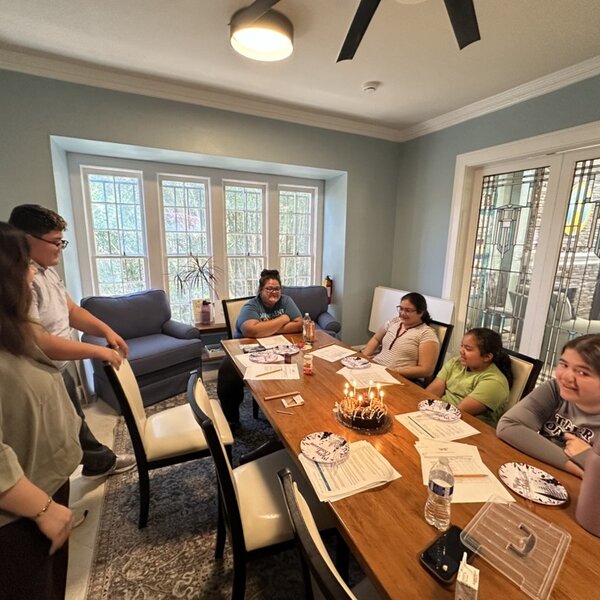Participants gather with Director of Grief Support Services, Jess Morales, to celebrate and memorialize during the recent Grief & The Holidays specialty group.