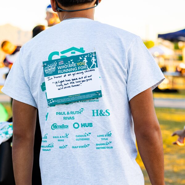 A runner shows off his custom memory run bibb in honor of all grieving children during the 2026 Annual Memory Run/Walk at Ascarate this past Spring.
