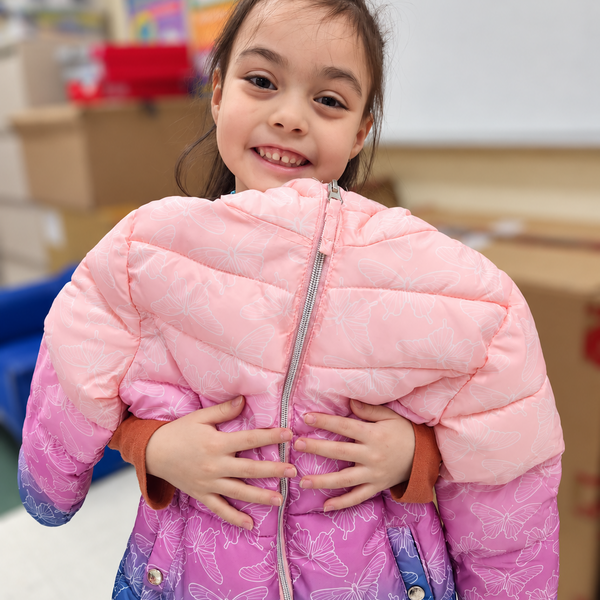 Help Keep Kids Warm—One Coat, One Smile at a Time.